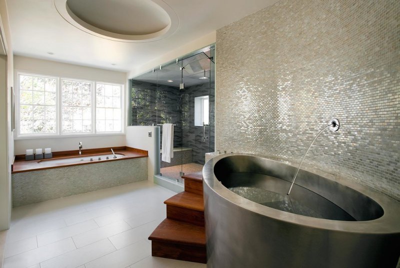 large bathroom soaking tub with fountain