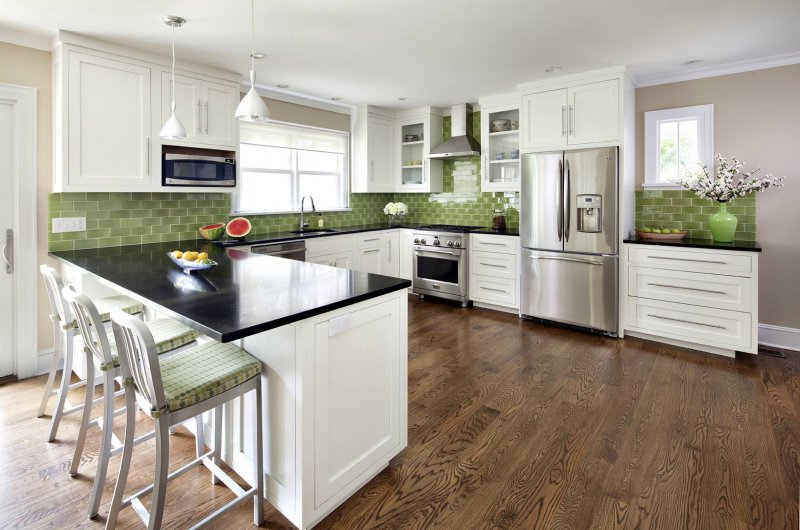 white kitchen green backsplash