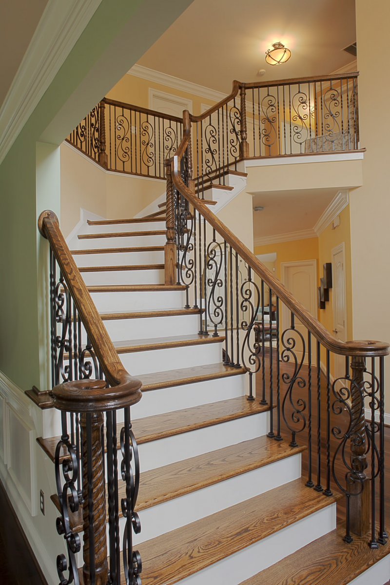 wood stairs with wrought iron railing